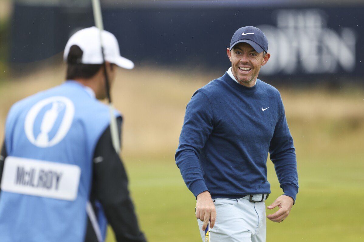 Tiger Woods diz que até campeões erram putts. Rory McIlroy recebe a mensagem no British Open